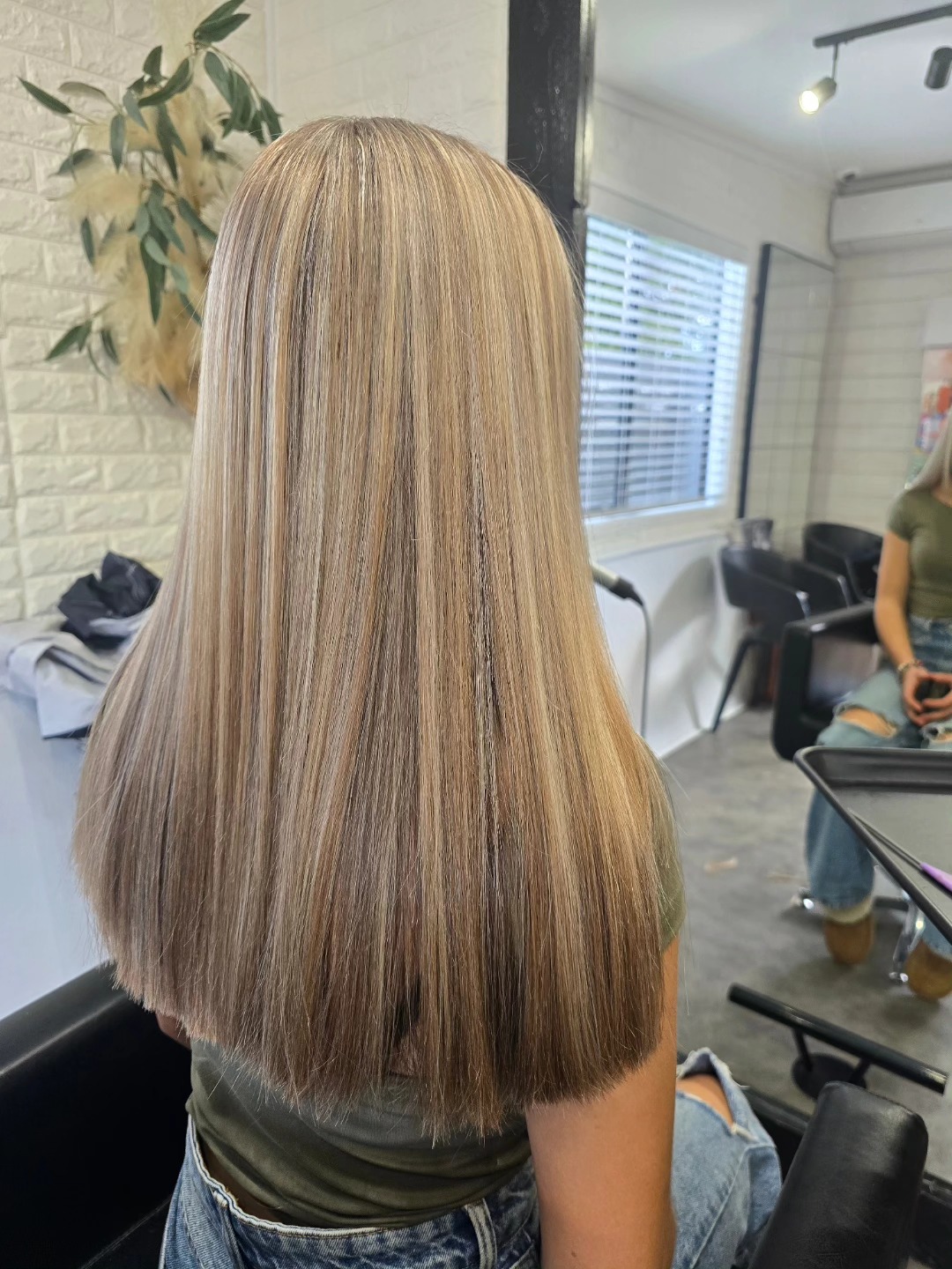 Ash blonde straight hair with foil highlights at Studio 15 boutique salon Waipapa Northland