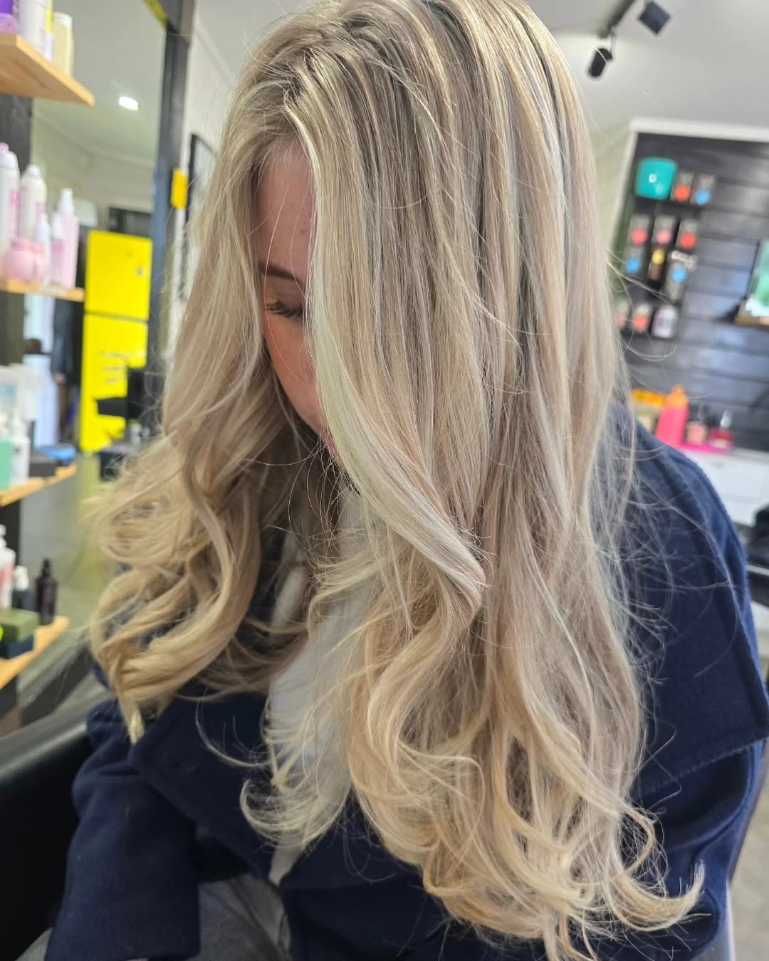 Blonde bouncy curls blowout styling at Studio 15 boutique salon Waipapa