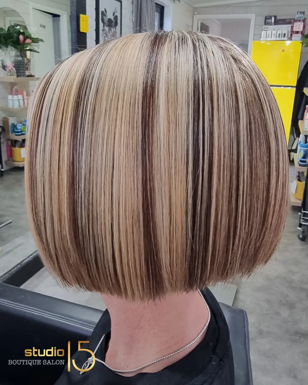 Blonde foil highlights on classic bob at Studio 15 boutique salon Northland