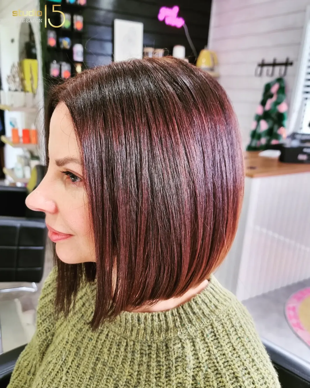 Rich burgundy sleek angled bob cut at Studio 15 hair salon Waipapa Northland
