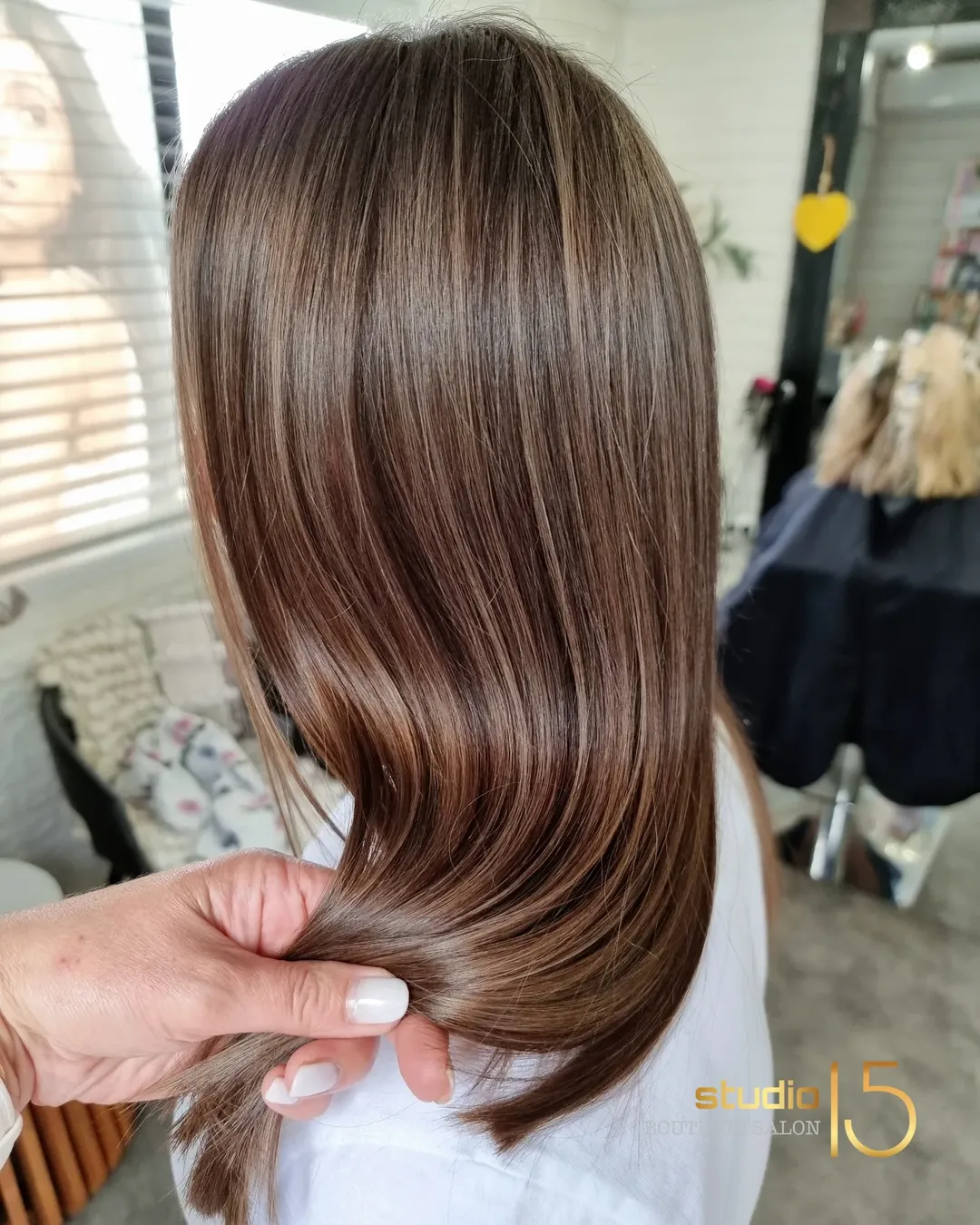Chocolate brunette glossy smoothing treatment at Studio 15 hair salon Northland